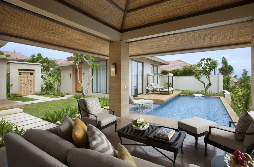 The Mulia Family Villa Nusa Dua with private pool green garden and covered outdoor lounge area