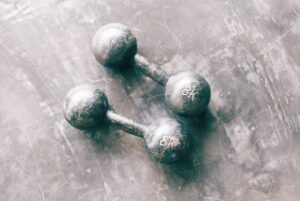 two grey light dumbbell
