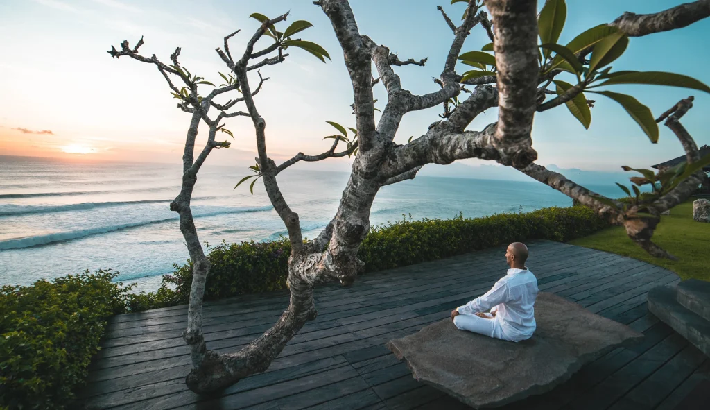Outdoor yoga session at The Istana in Uluwatu, Bali